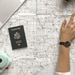 Technology Travel - Person Pointing a Location on the Map