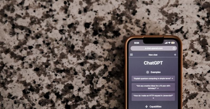 AI ML Finance - A cell phone with the app on it sitting on a granite countertop
