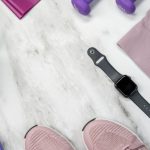 Smartwatch Features - Sports Equipment of Top of Marble Surface
