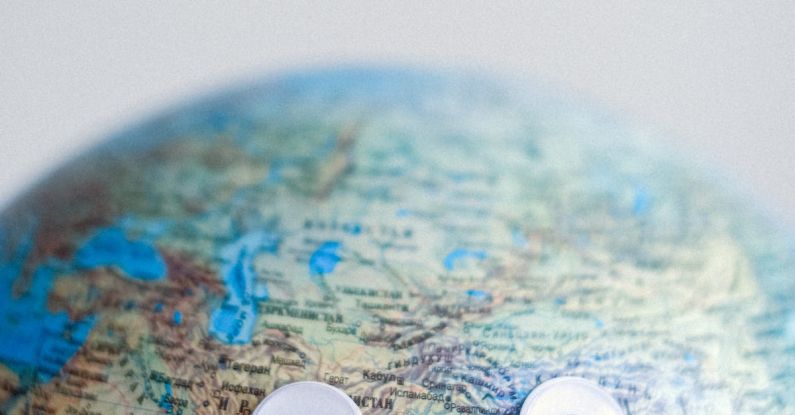 5G Impact - Model of globe with googly eyes representing Earth as character with need of protection