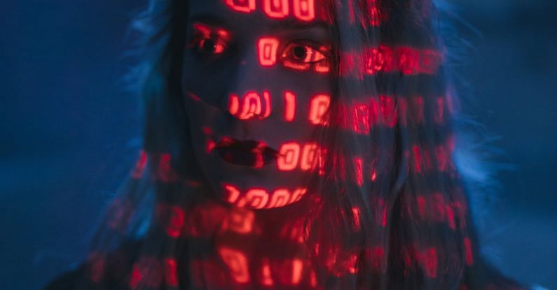Cybersecurity Trends - Woman With Red Light On Face