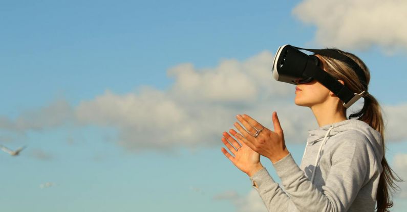 VR Applications - Woman Using Vr Goggles Outdoors